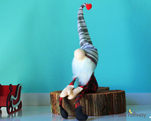 Buffalo plaid stuffed gnome with striped hat - Carlsen - ThePebblePathway