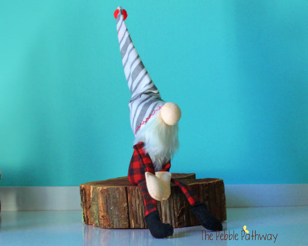 Buffalo plaid stuffed gnome with striped hat - Carlsen - ThePebblePathway