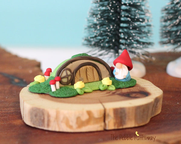 Micro mini gnome with tiny gnome home on cedar wood slice - ThePebblePathway